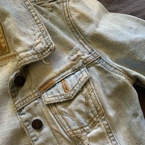 Cropped and distressed denim hollister jacket